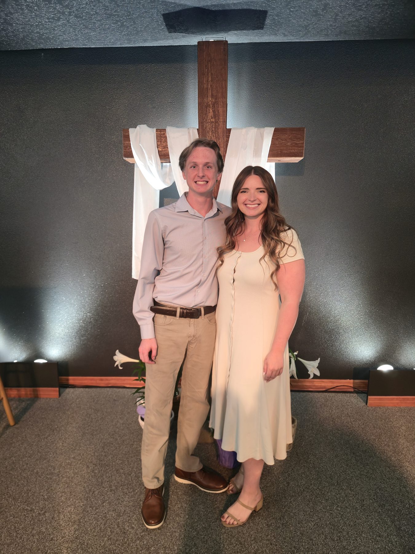 Hannah and Lucas smiling together at church